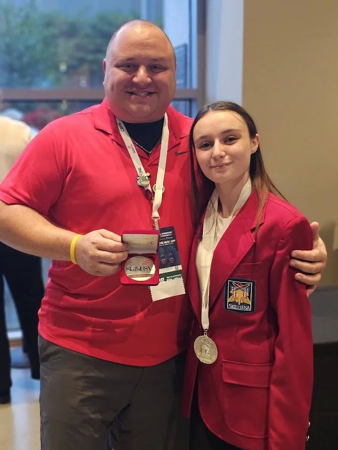 Mr. Pavia congratulates Alyssa