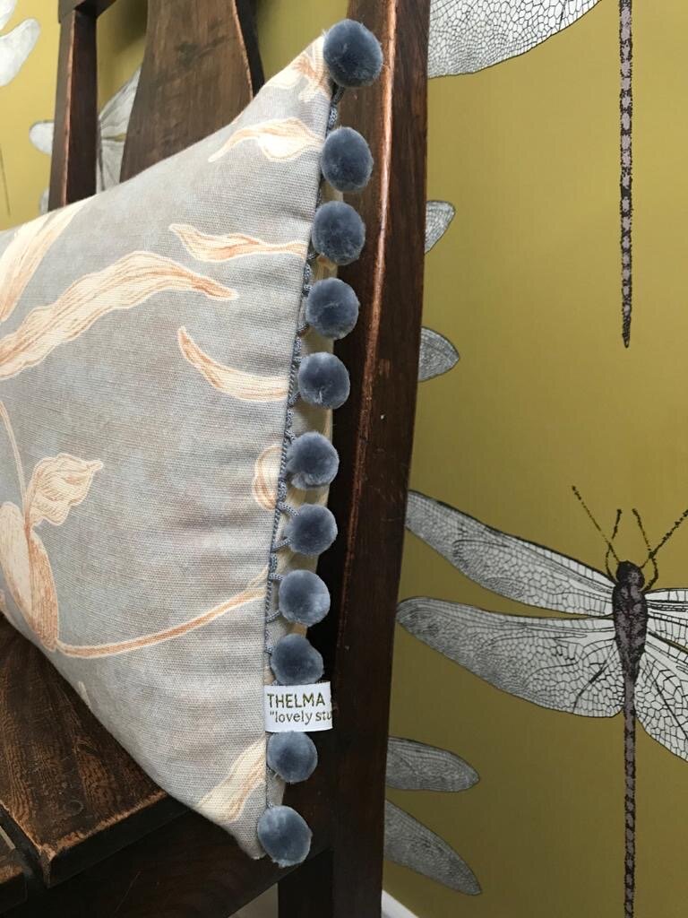 Lewis &amp; Woods Squawk Grey Gold botanical print luxury feather filled rectangle cushion with pompoms