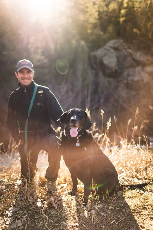 Our founder, Tim, enjoying the great outdoors with his adventure companion and inspiration, Ruger.