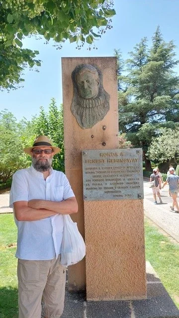 Research in Spain, hanging out with Welles and Hemingway and a Black Tie event with nefarious characters