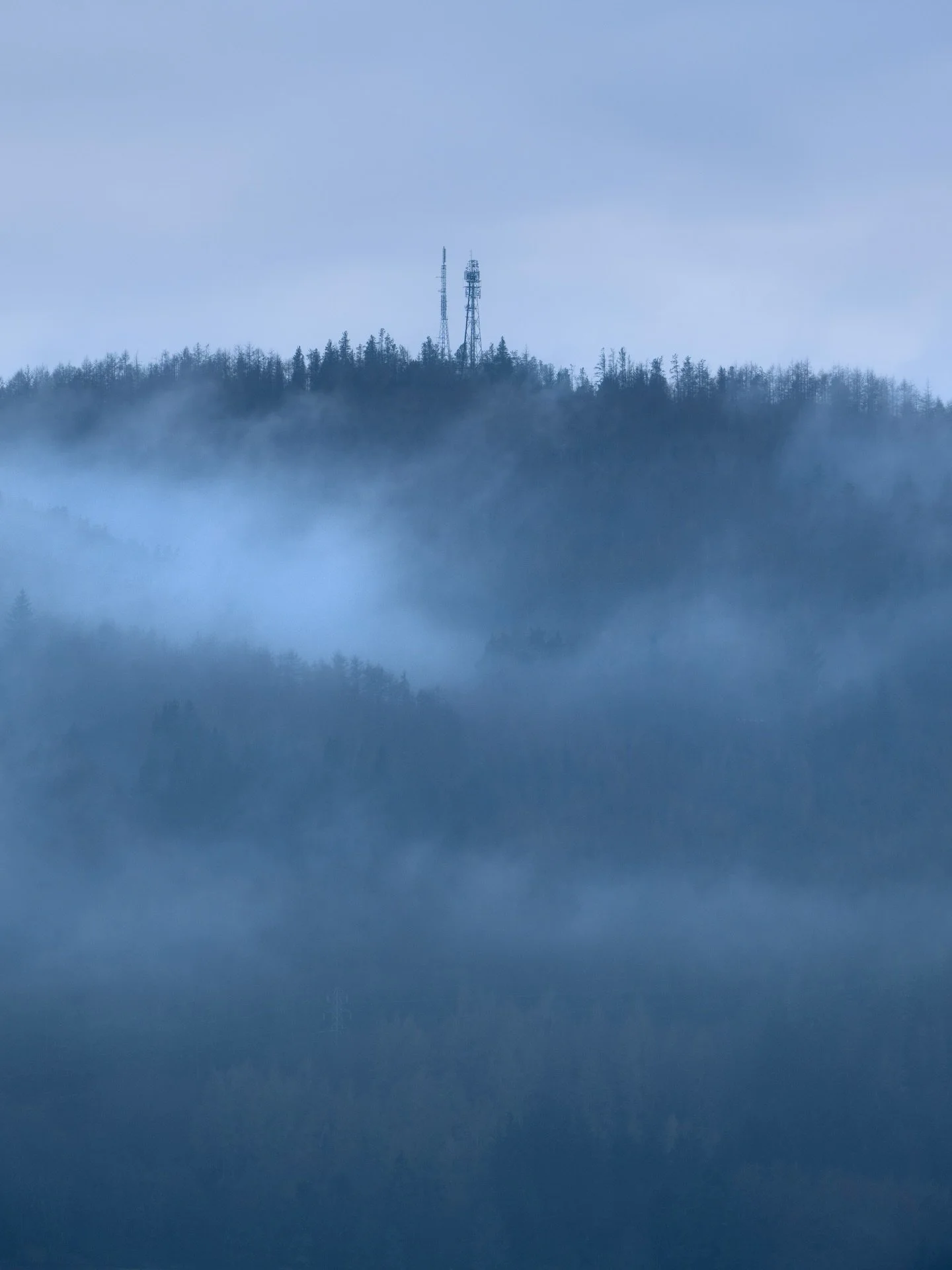 Brief moments between the rain recently. Soft blue tones and muted light, and the atmospheric mist drenched forests and hills of northern Perthshire.

#mist #landscape #winter #landscapephotography #scotland