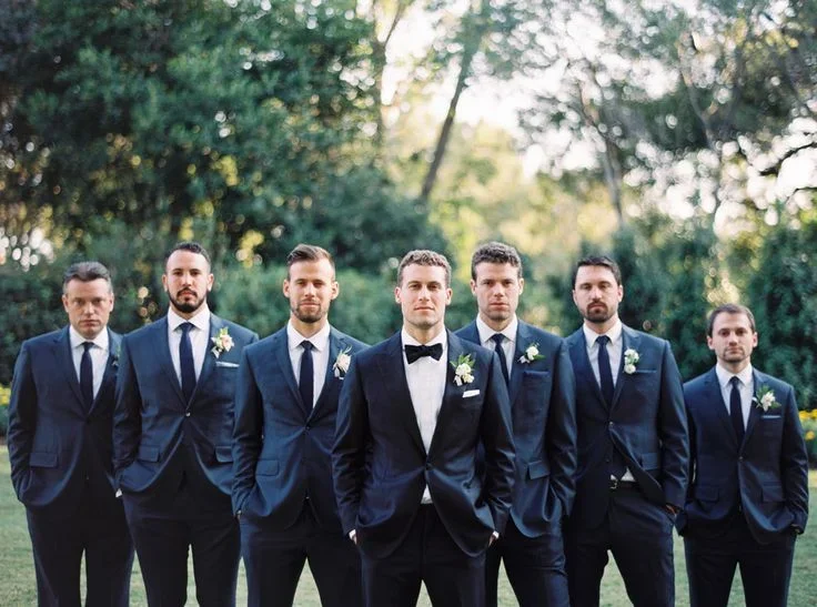 ae5ec001223ce15329d478dcc2728d36-groomsman-attire-groomsmen-suits.webp
