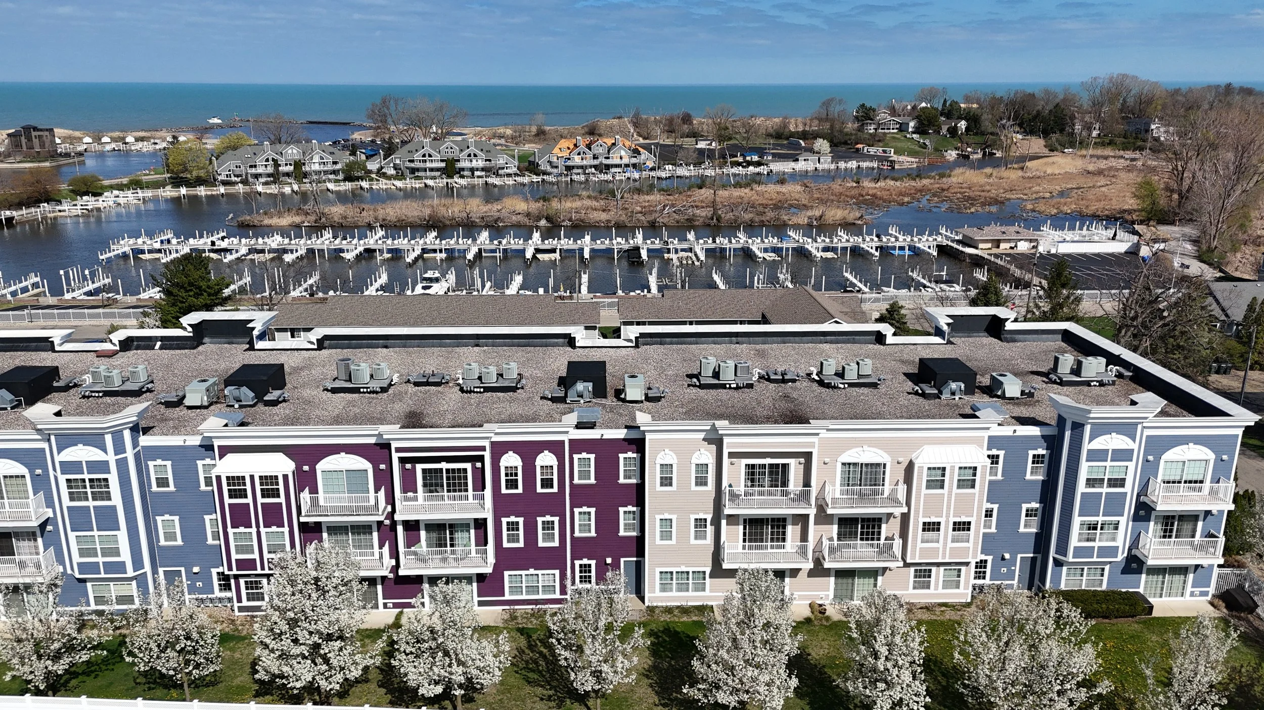 New Buffalo, MI, 235 N. Whittaker St. #30, Downtown New Buffalo condo for sale by the Justin Lucas Group with @properties Christie's International Real estate, airbnb friendly, investory friendly, beach, stray dog, harbor, for sale