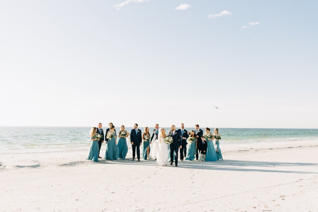 The best bridal party crew for when you say, &quot;I do!&quot;.
.
The McCall wedding had a fun crew standing by their side on their wedding day. The coastal variety of blues on the bridesmaids looked STUNNING on them which was perfectly accented by t