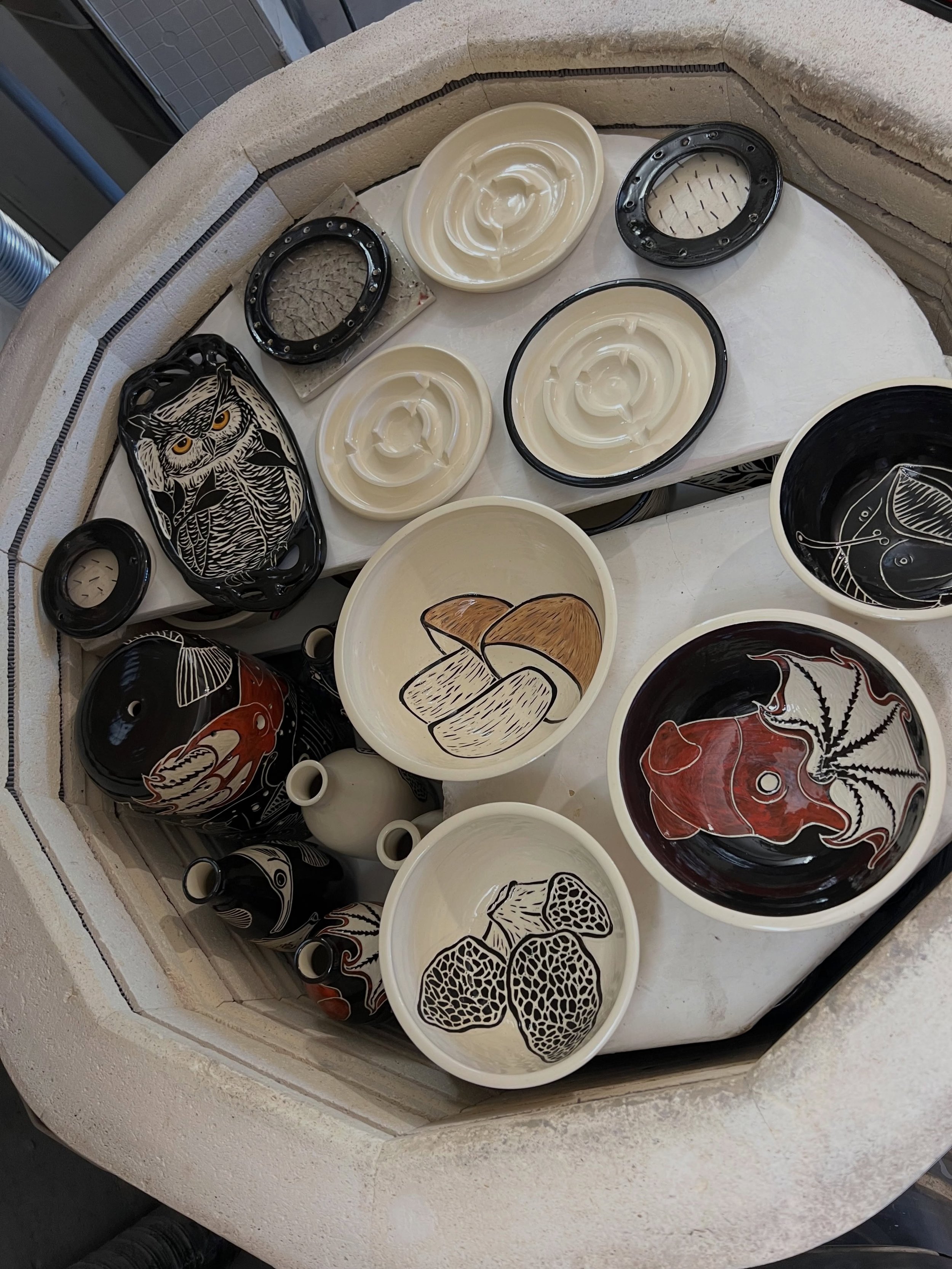 Kiln unloading! Admittedly, this is sort of a tease post because you can&rsquo;t really see the details from above.  Good photos are coming, just incredibly distracted by bees right now.  Excited about new butter dishes, nesting bowl sets, and new de