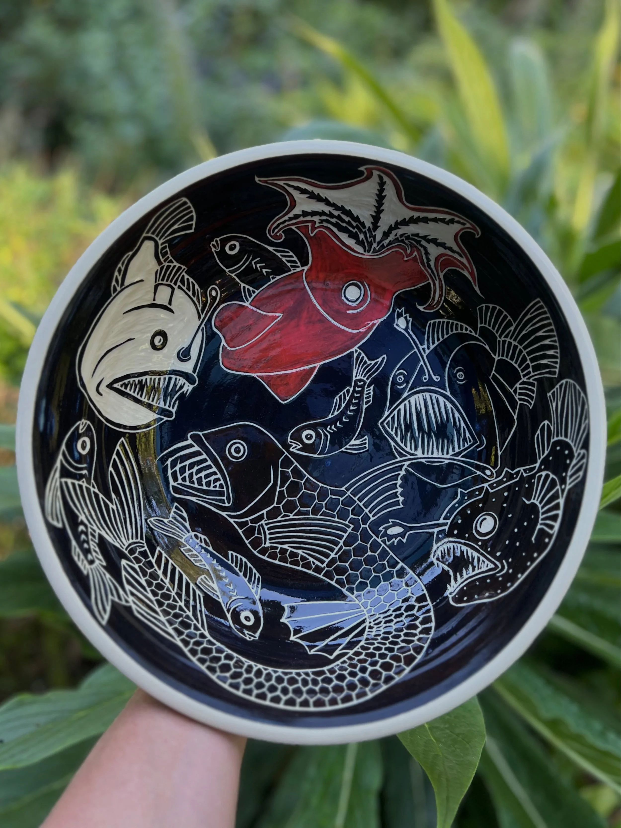 Some marine bowls from my last load

#deepsea #sgraffito #humpbackwhale #pottery #bowl