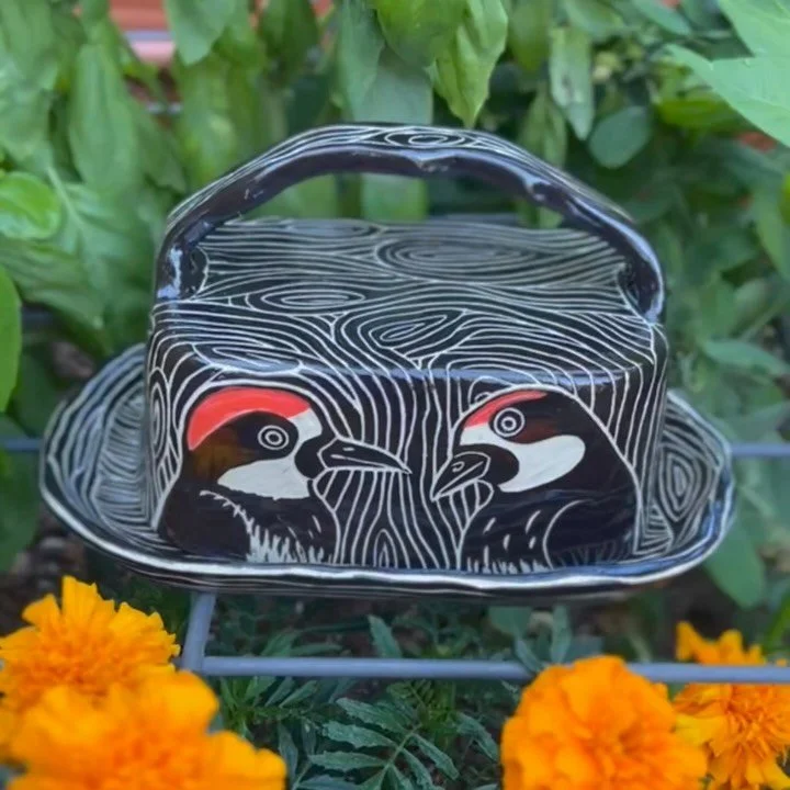 Two new Butter Dishes- Acorn Woodpeckers and Water Fowl.  They're big enough to be covered snack platters if you prefer.  I've been enjoying all the decorative real estate.  Dishwasher, Microwave and oven safe.  Baked brie? Baked garlic?  I'll have t