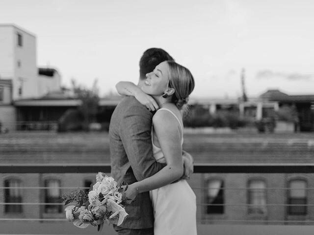 Freshly married hugs on a Williamsburg rooftop. 🖤