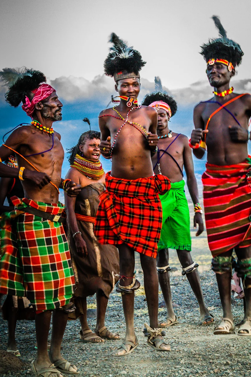 Color It Red -3 Feathers in their Hats_Turkana Men_TGold_.jpg