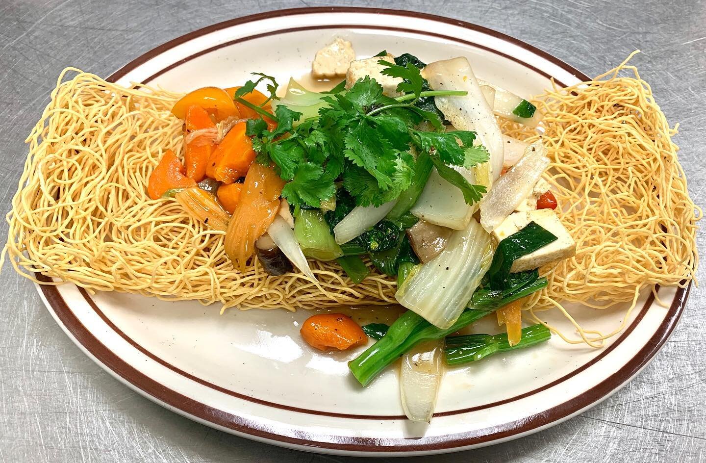 more veggie filled dishes for our vegetarian friends! crispy egg noodles with veggies! 🌽 🥕 #raleigh #raleighfoodpics #raleighnc #raleighfoodies #raleighrestaurant #noodles #triangle #trianglefoodies #trianglerestaurant