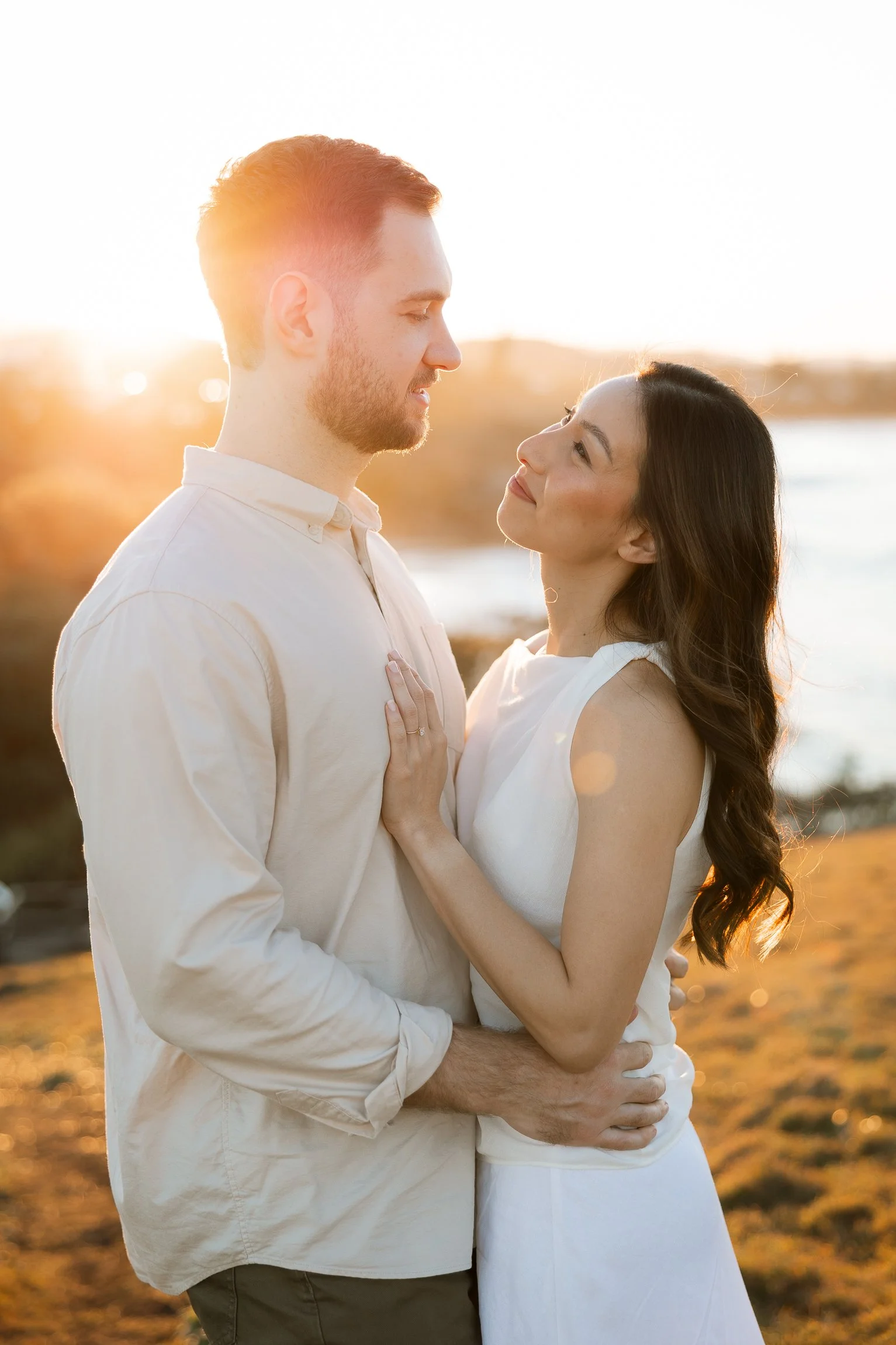 A golden afternoon engagement session at Cabarita Headland