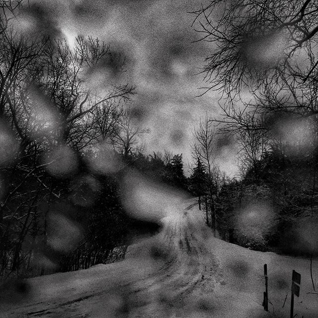 Snow on gravel road near Swisher, Iowa, 2019. Photo by @dannywilcoxfrazier #outinthesticks @viiphoto #lostnationusa