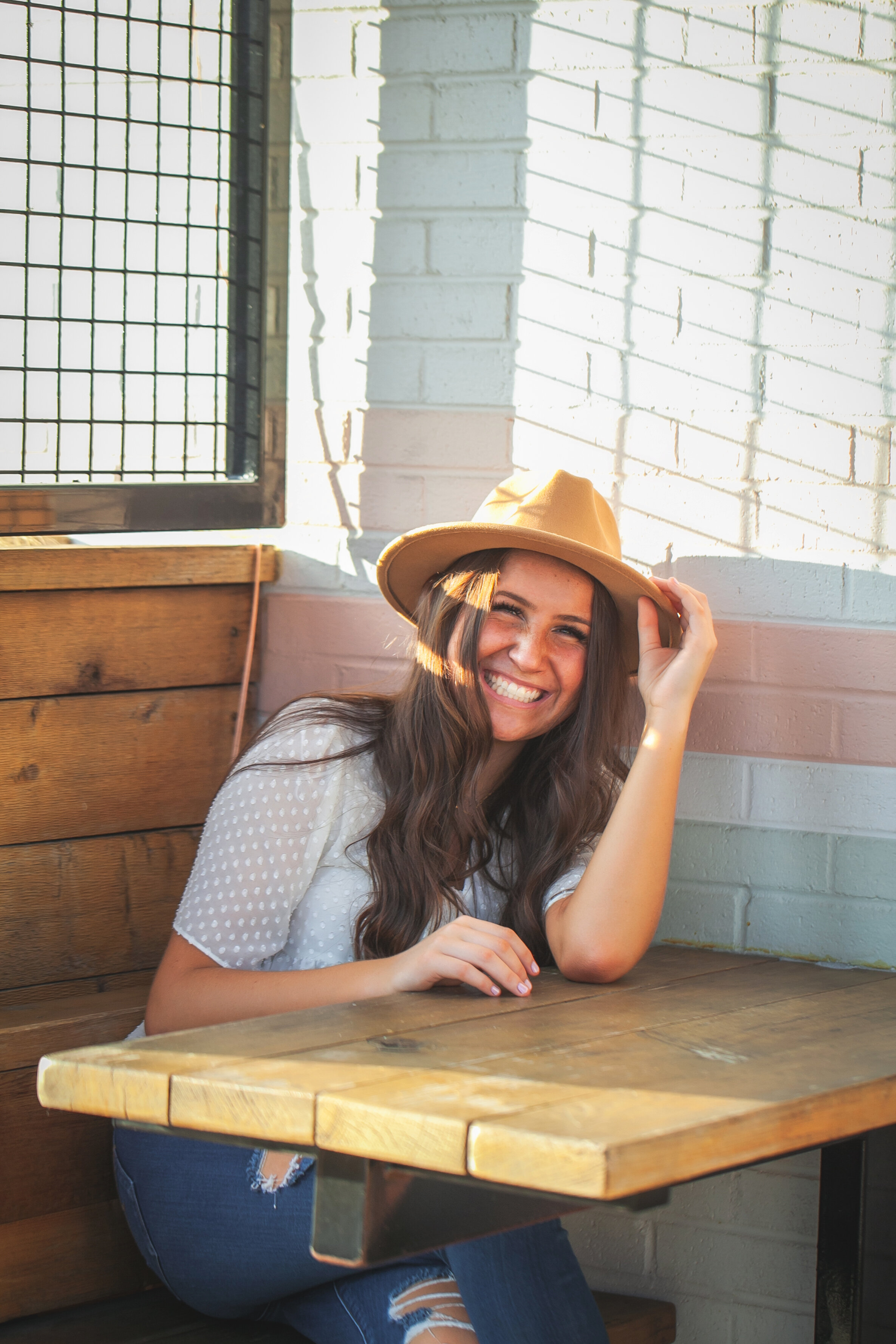 coffee-shop-senior-session-style-hat-laughter-graduation-photos-fort-worth