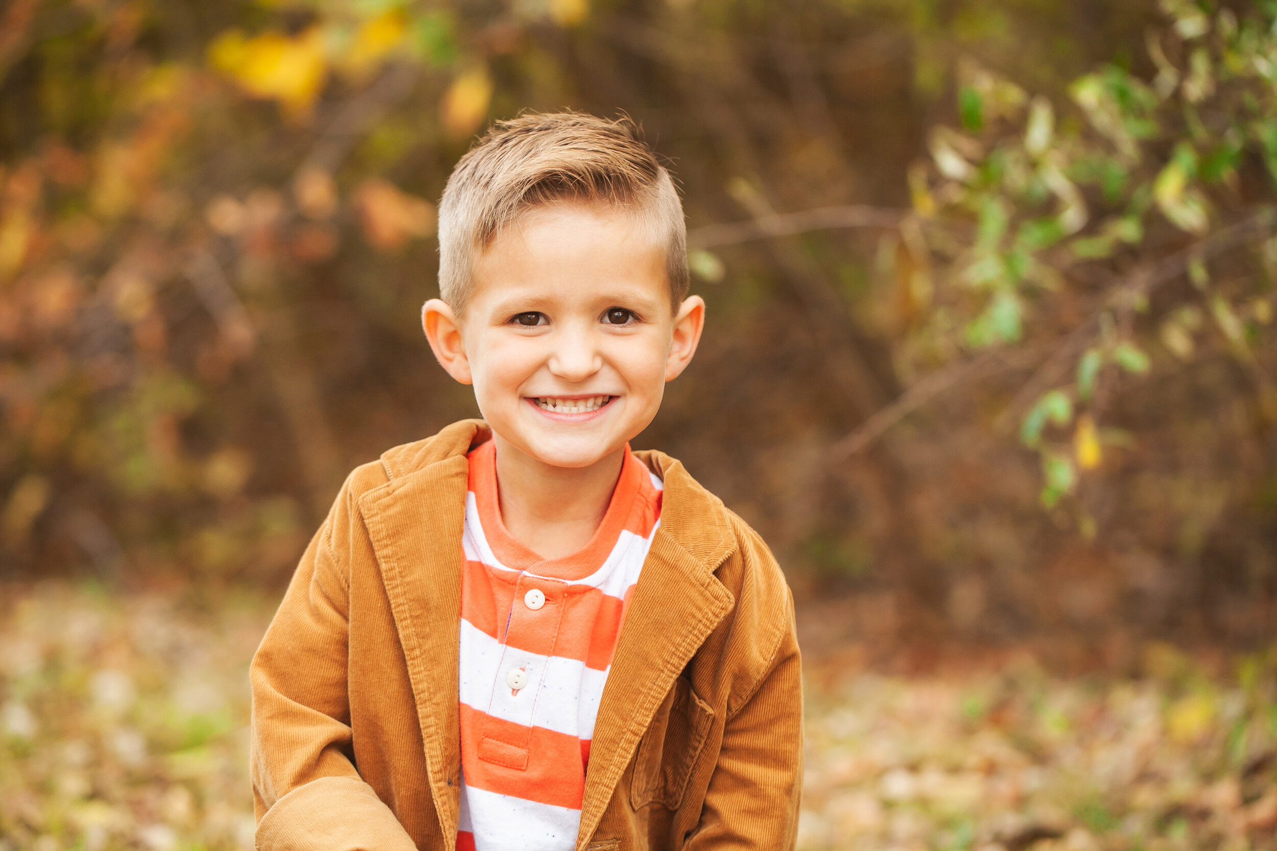 mischievous-boy-photograph-family-fall-portrait-session-colleyville-tx