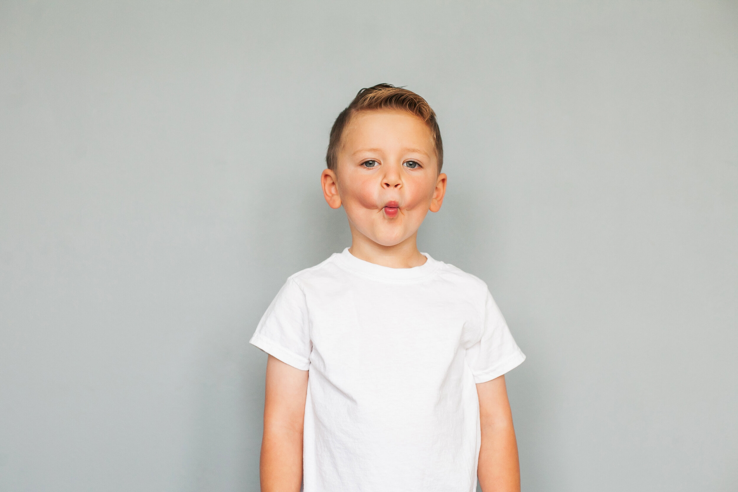 funny-face-boy-children's-portrait-session-colleyville