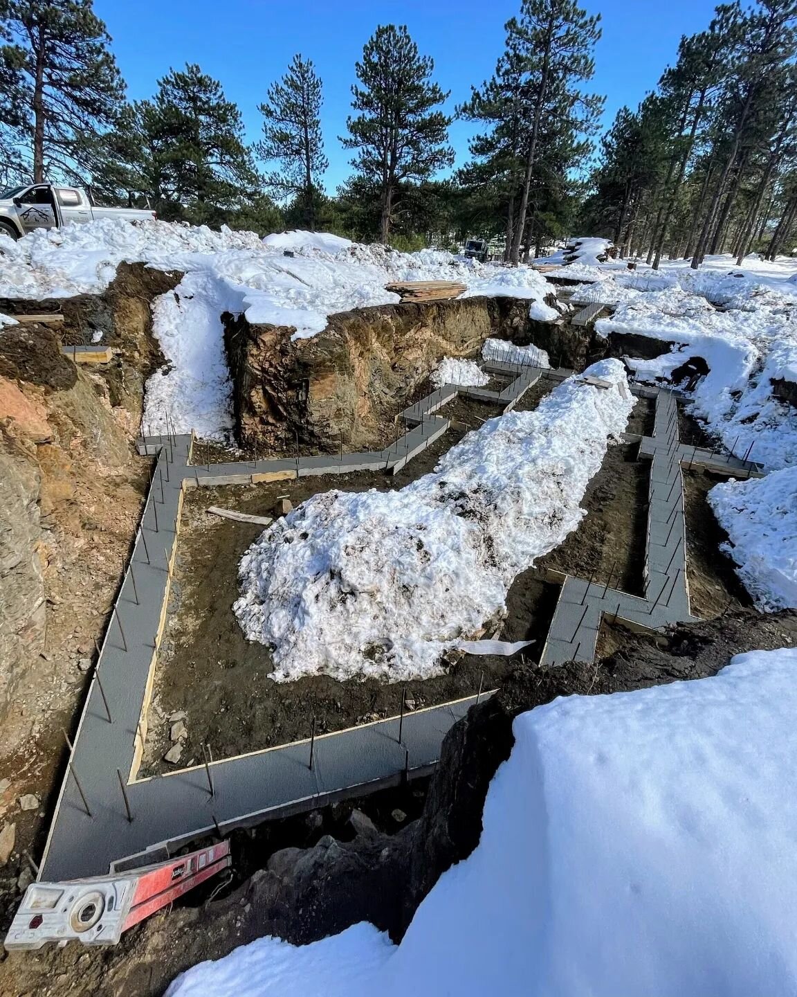 A little (or a lotta) snow doesn't stop our subcontractor partners from pouring foundation footings! We get it done! 

#buildinginallweather #buildinginthemountains #generalcontractor #footings #constructionpartners #subcontractor #concrete #customho