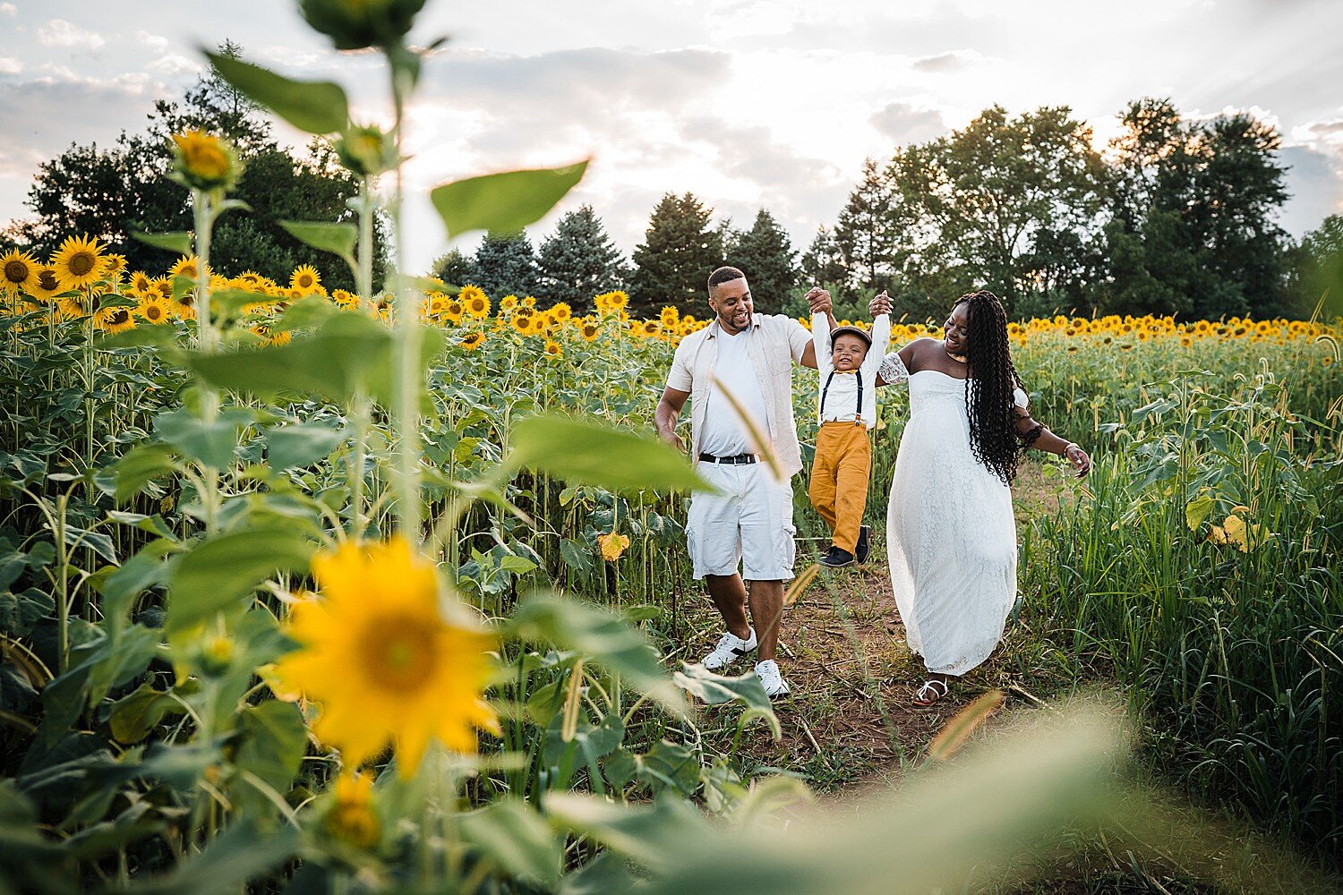 family sunflower photo session at Gray Apple Market