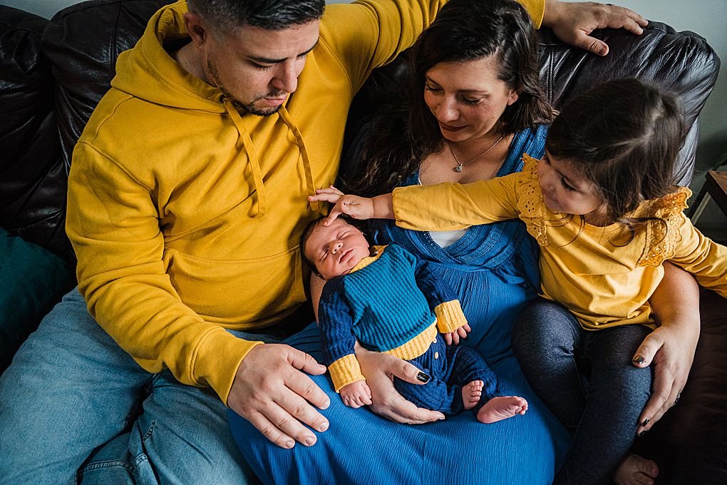 family of four with a daughter and newborn son