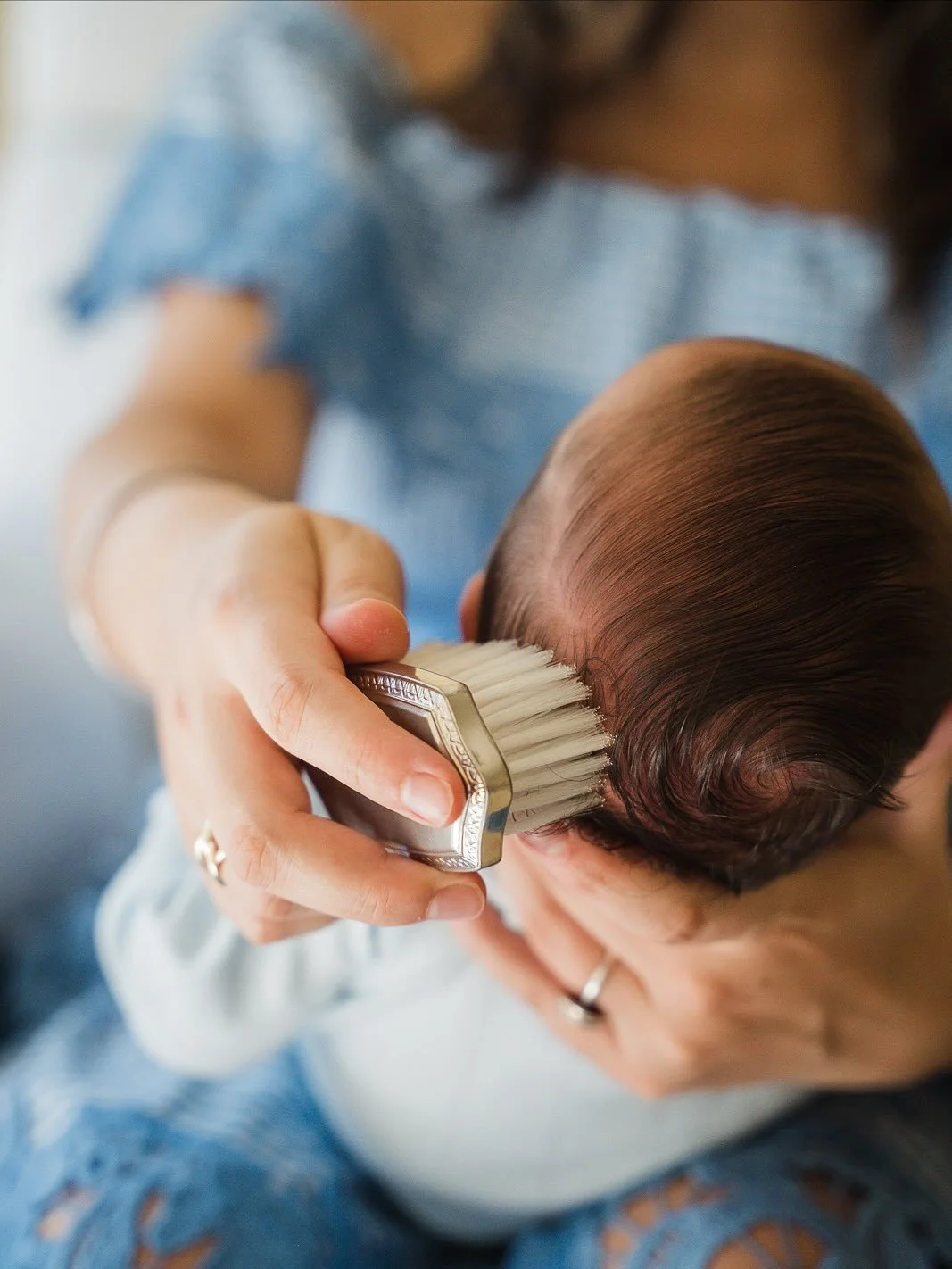 The little details that tug at your heartstrings. This hairbrush was once used on baby boy's mom when she was little ❤. I adore incorporating sentimental heirlooms and handmade treasures into newborn sessions. Every newborn session with me includes a
