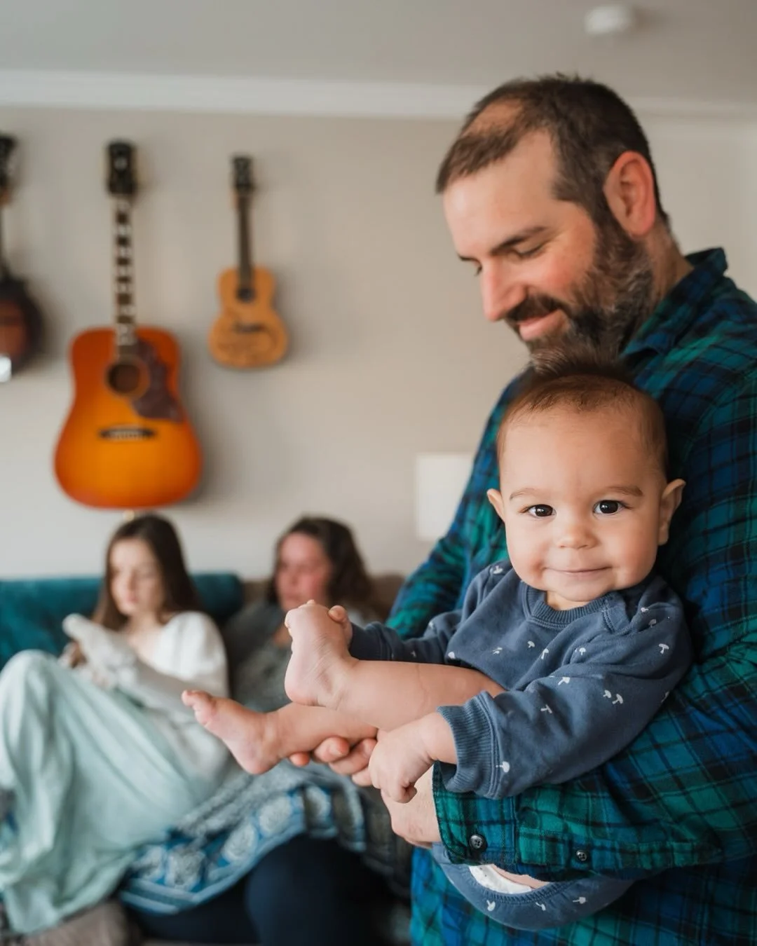 Now and then. Documenting baby Ellis as a newborn and now as a smiling curious, clapping, crawling one-year-old cutie. His mom thought it would be special to do his one year session at home since he was born right around Christmas time and we did his