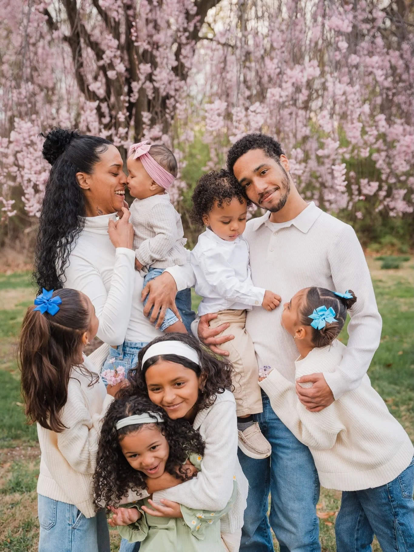 Family photos with me are rarely about sitting still. I might ask you to play London bridge, give someone a piggy back ride, or cuddle up and read a book together. I want to take photos where you can feel connection, joy, and real life moments. And o