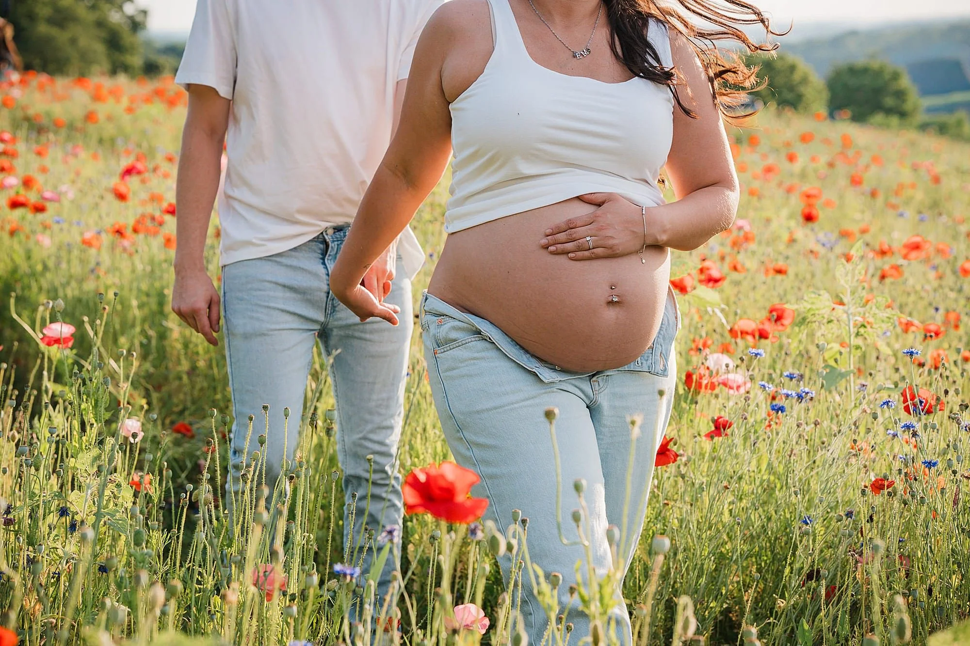 bare belly maternity photos wildflower field