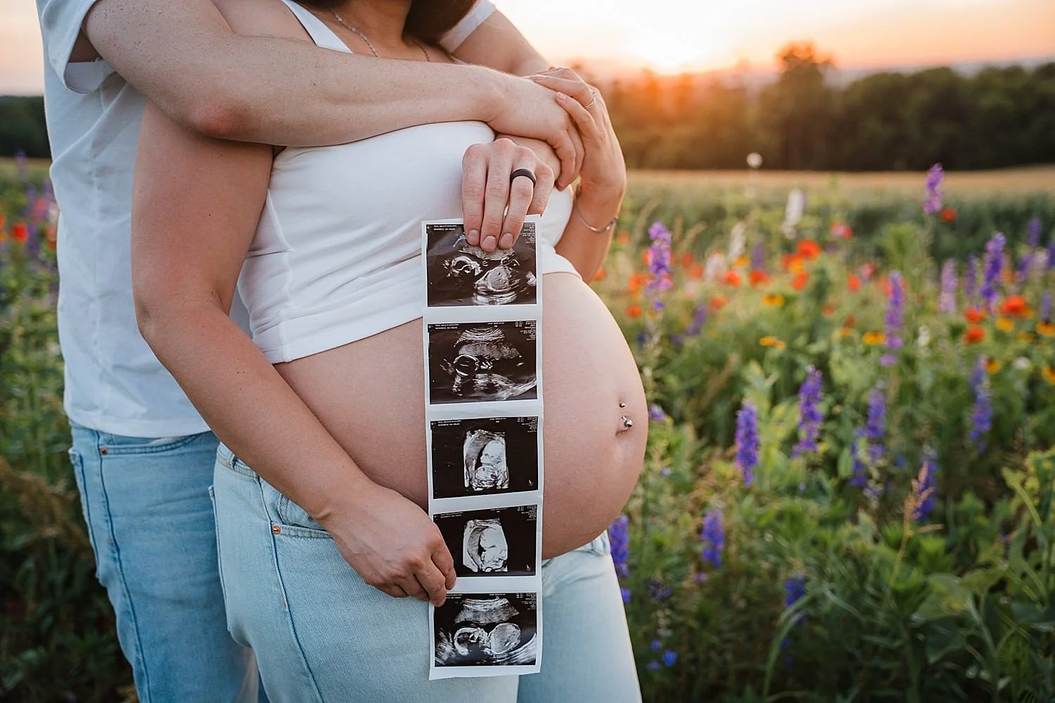 bare belly maternity photos in the wildflowers