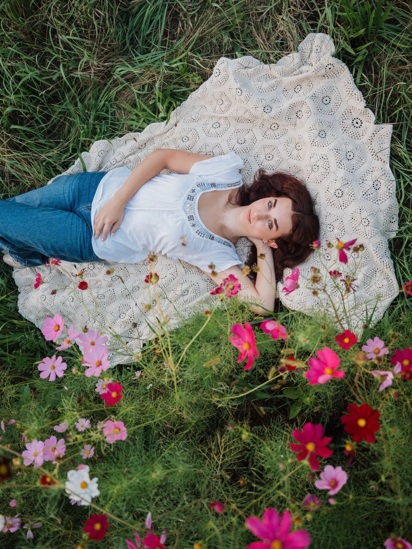 She may have the most stunning eyes I&rsquo;ve ever seen. I&rsquo;m always looking for opportunities to create layers in my photography and the location for this senior session provided many: willow tree branches, dandelion seeds moving through the a