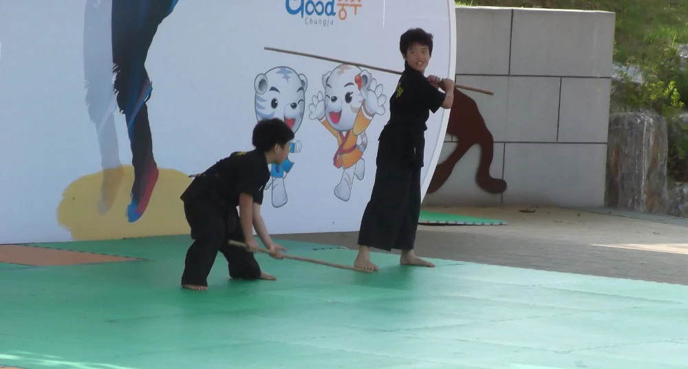 Korean-children-with-sticks.jpg