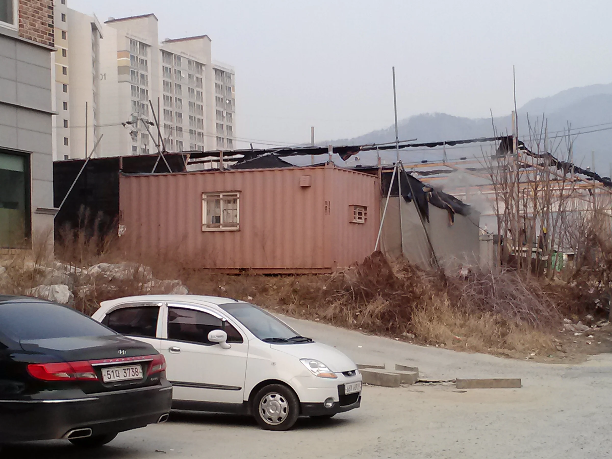 Container-and-Cars-e1415521676994.jpg