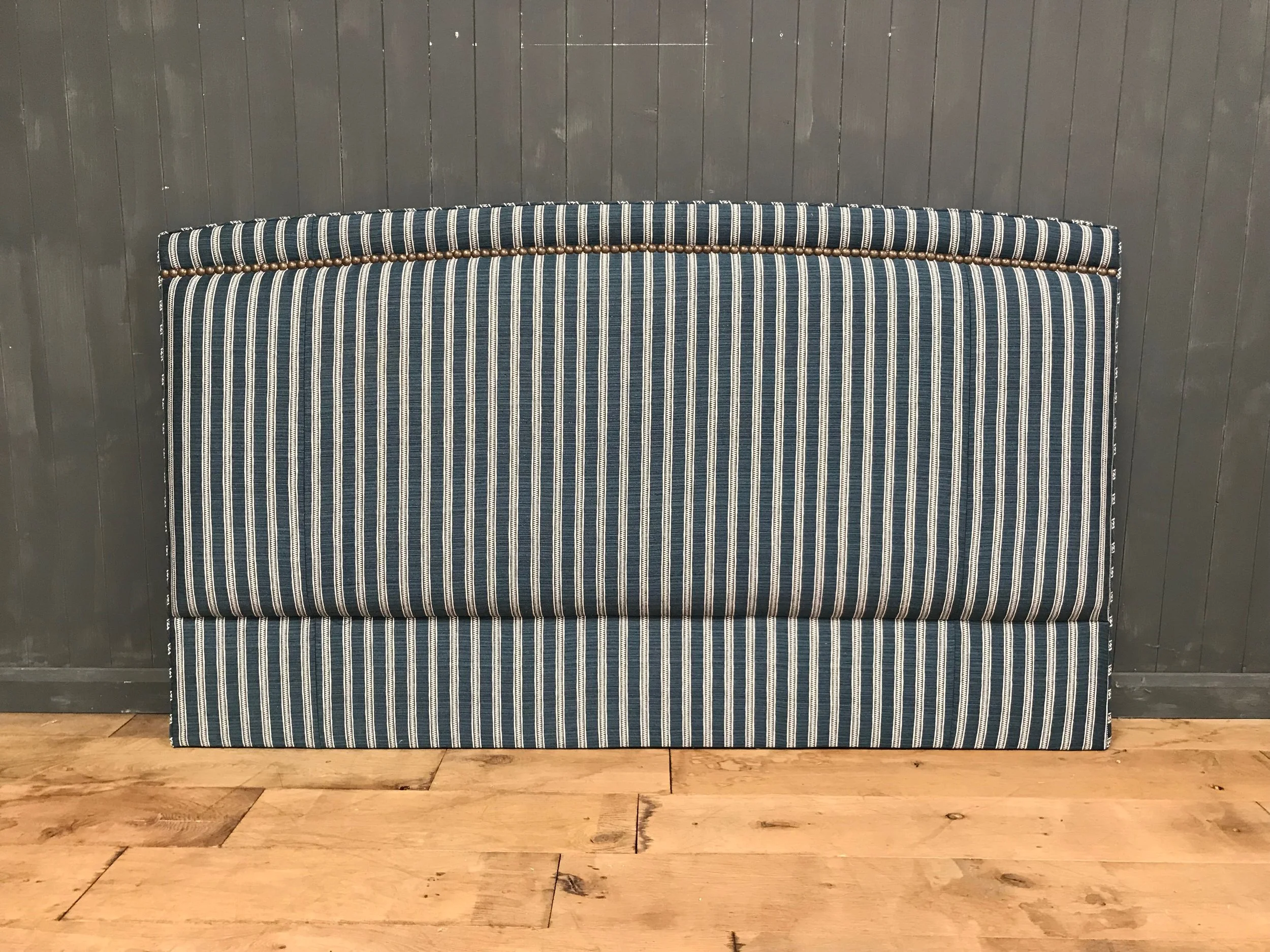 Bespoke Upholstered Headboard, slightly curved with studded border to top edge only