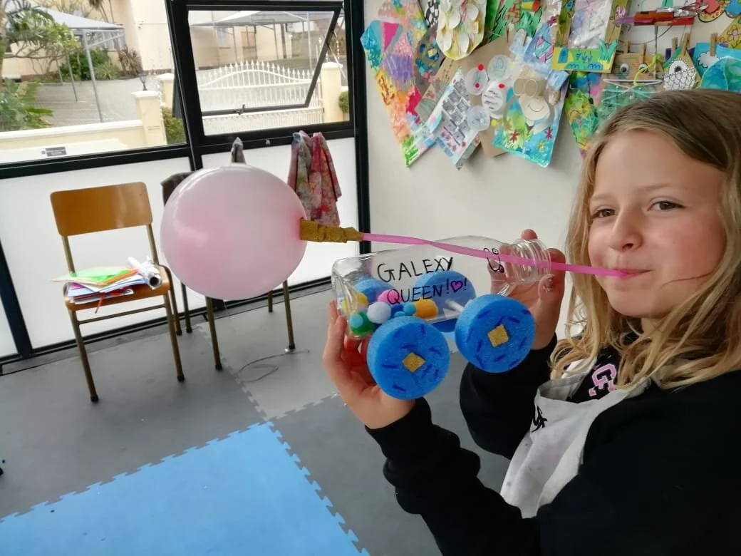 This girl came up with the idea to decorate her car from the inside using felt balls.