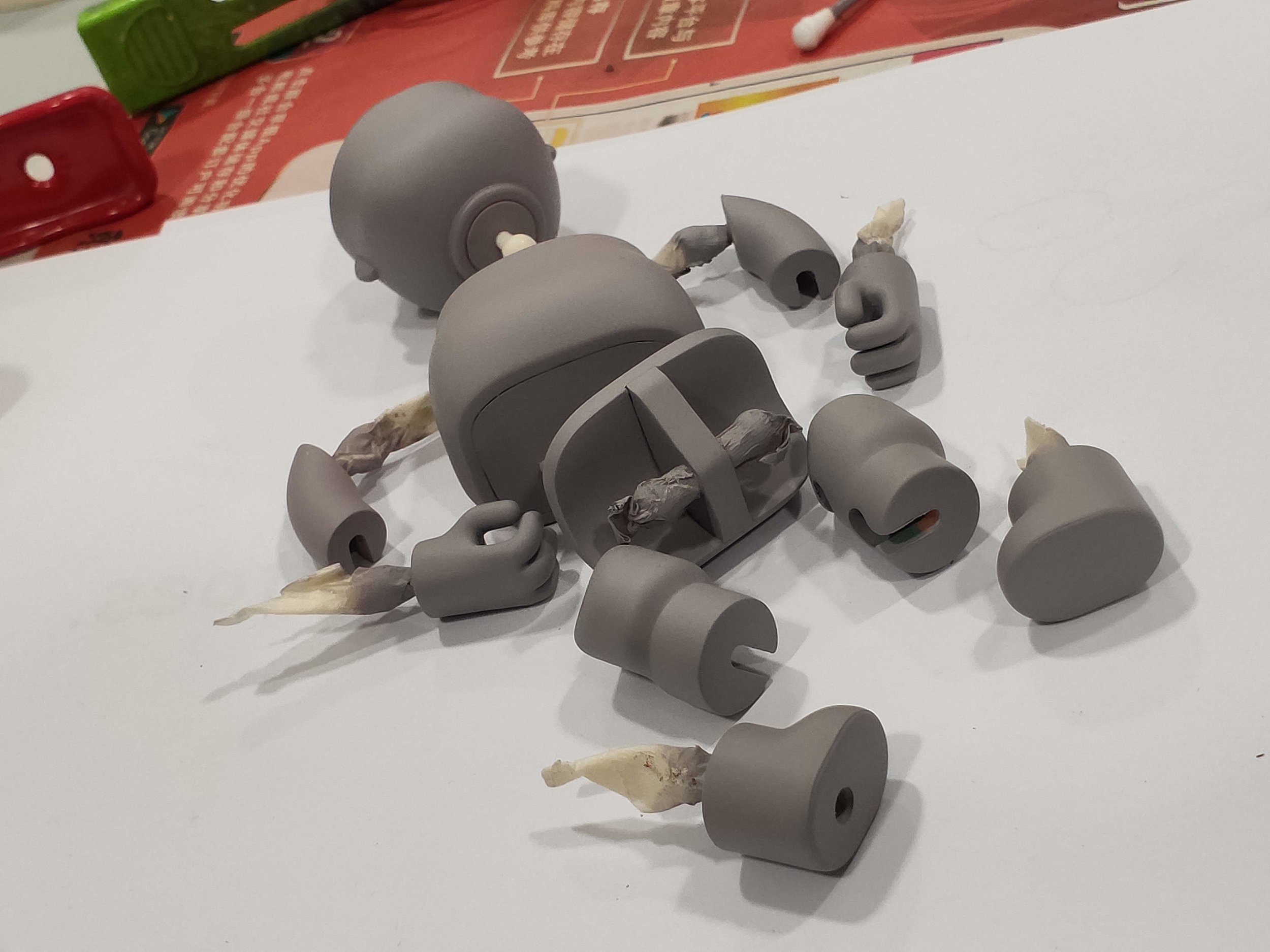 Here’s what it looks like after priming with all the masked nub-nubs. I used Vallejo primer for the primer coat.