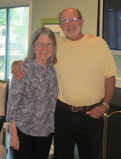 Sandra Pryor Clarkson and brother Bob Pryor smile at the camera.