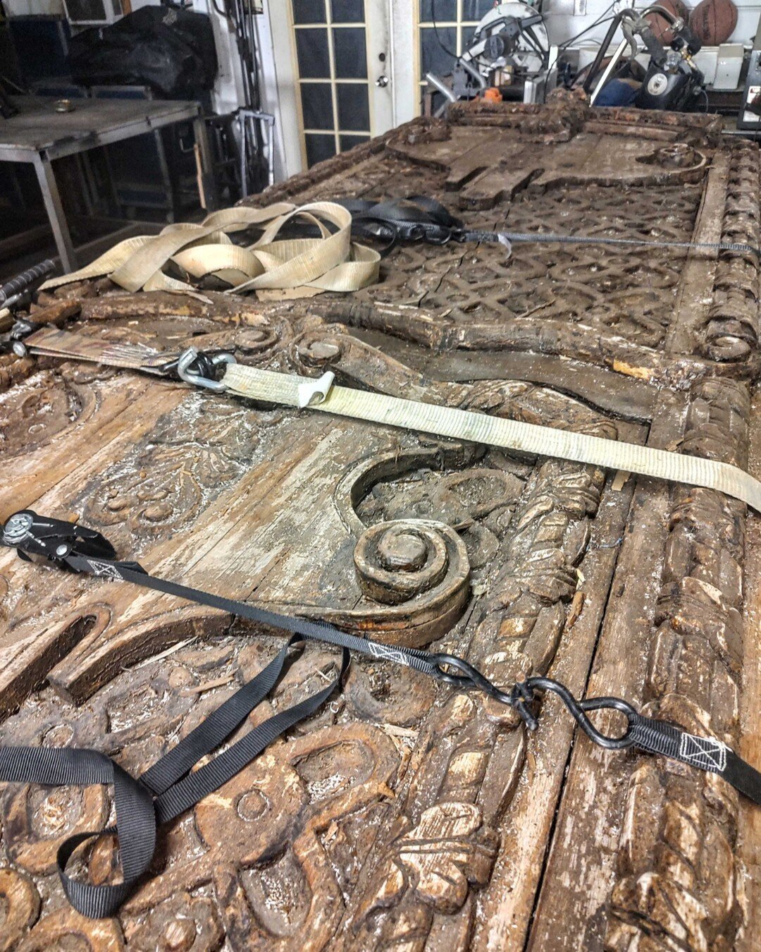 Preserving a piece of history to include in the new space. These hand carved doors will find their new home suspended in the lobby at #VictoryPlaza. #architecturalrestoration #runaarchitecture #runainteriors #lobbydesign #workshopwithruna @elevatedev