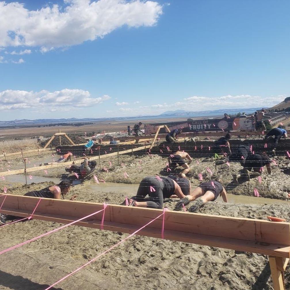 Crawling through the tranches during the Tough Mudder! (Copy)