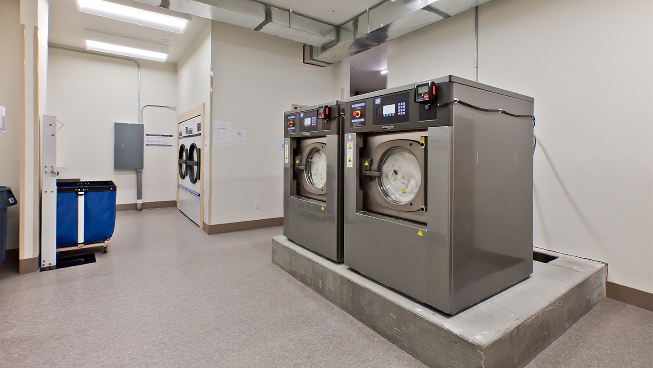 Holiday Inn Express &amp; Suites Hotel Large Laundry Room in Green River, UT - Facility Planning