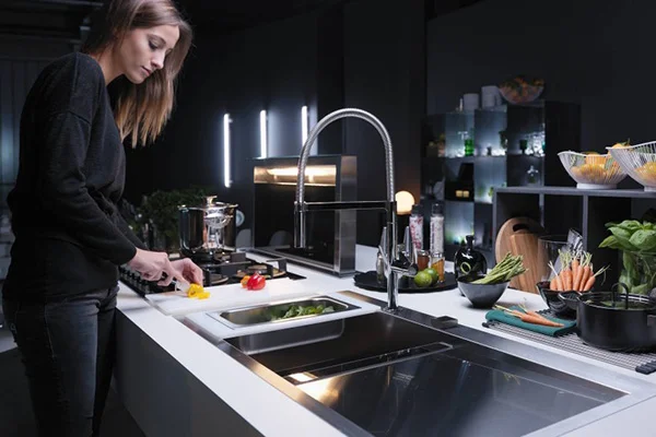 Franke has been an industry leader in kitchen products for years. They’re Chef Center Sink was love at first sight - clean modern lines incorporated with organized smart design. Such as, compartments for both compost and cleaning supplies as well as accessories like a roll up drying rack, a drop-in drain board, and a glass cutting board. By far the coolest sink I’ve ever seen. Learn more here