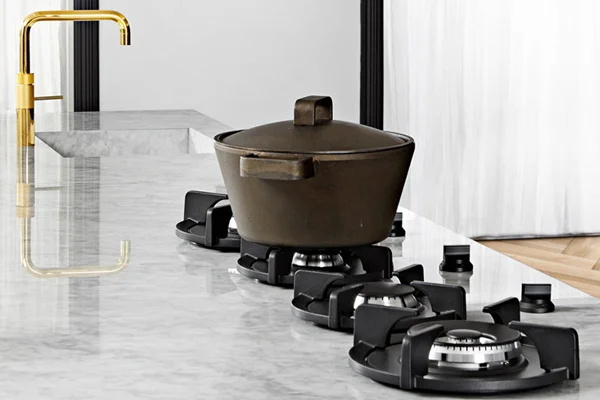PITT PITT cooking has completely revolutionized the stove top. Making their burners integrated into the counter top creates an exquisite look while remaining extremely functional. When I first saw them, there was no question in my mind that they had to be incorporated into the Kitchen design. You can find PITT cooking via Better Distribution. Learn more here
