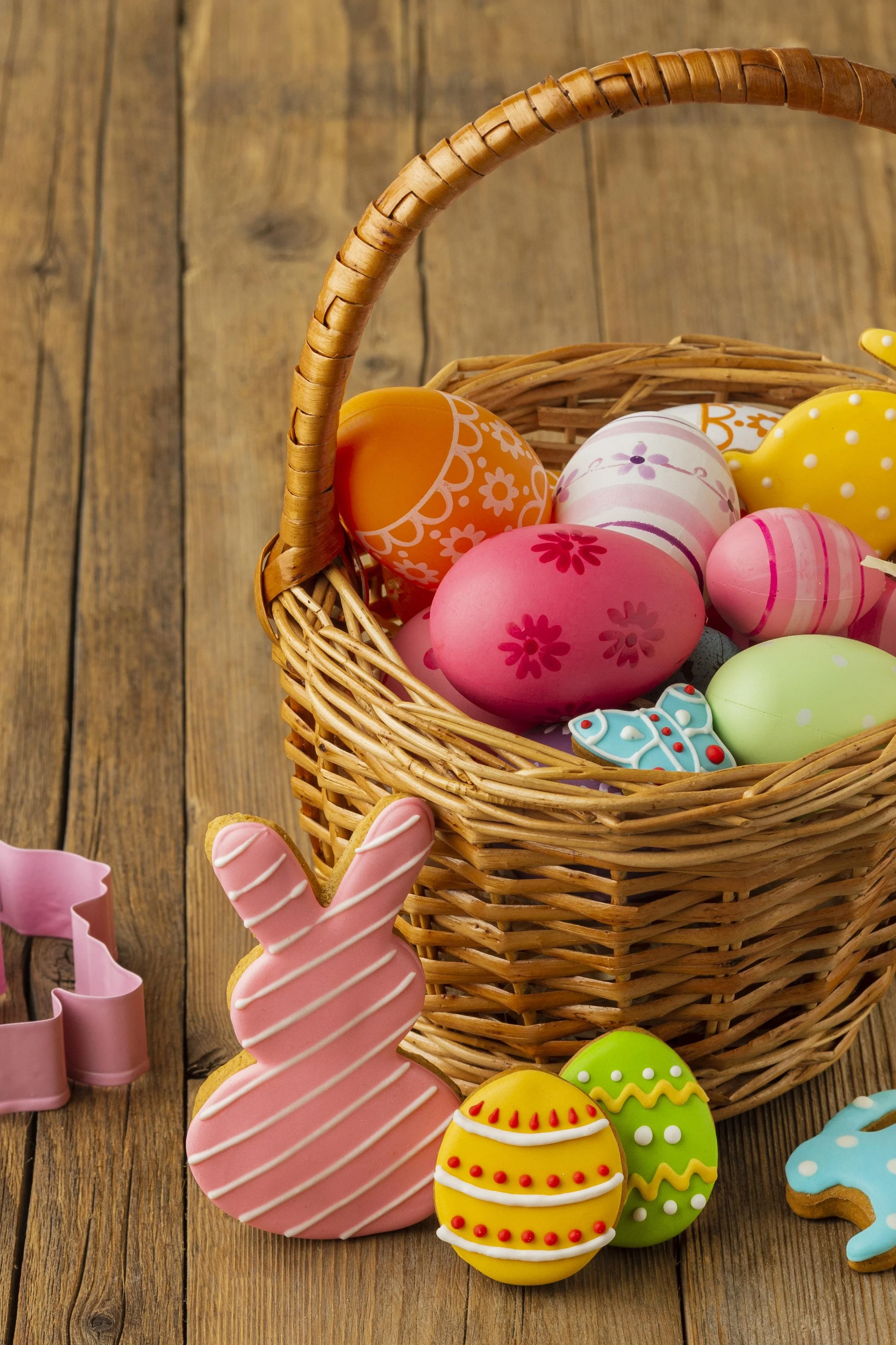 high-angle-colorful-easter-eggs-basket-with-bunny.jpg