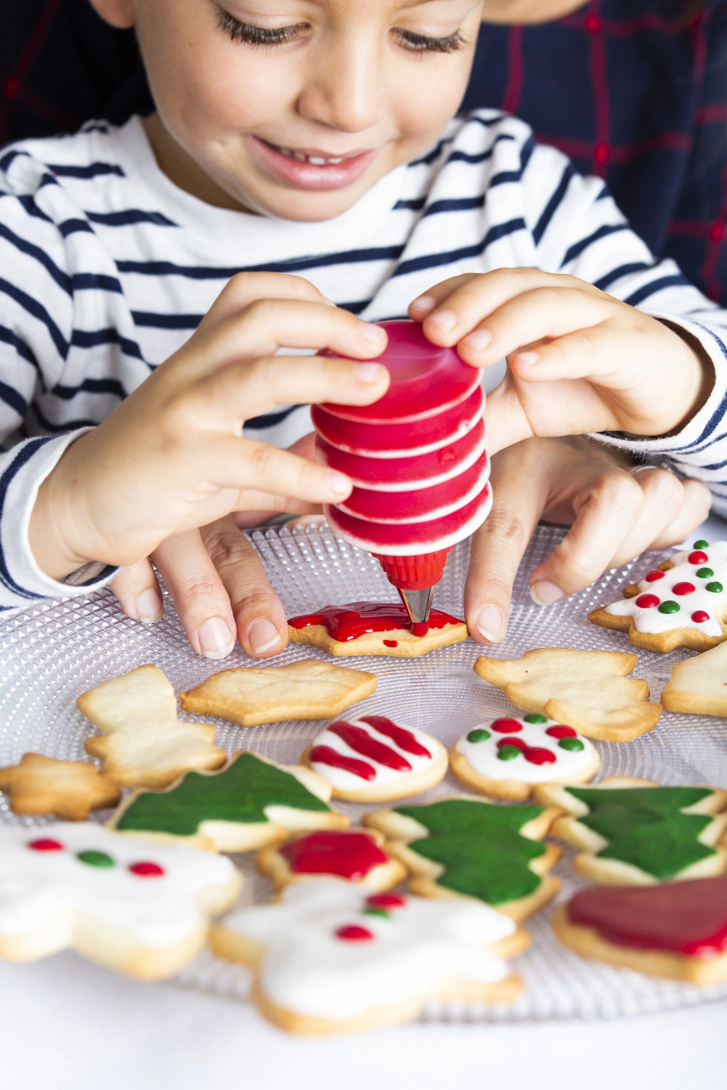 smiling-boy-preparing-gingerbread-cookies-home.jpg