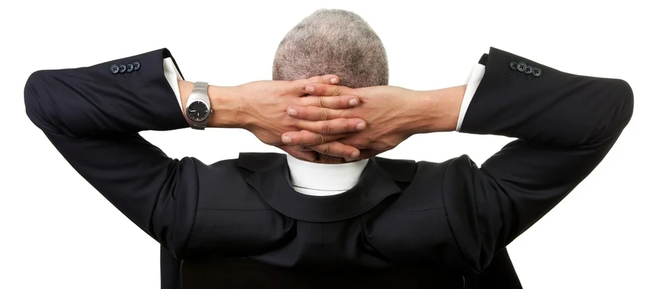 042083062-businessman-leaning-back-chair.jpeg