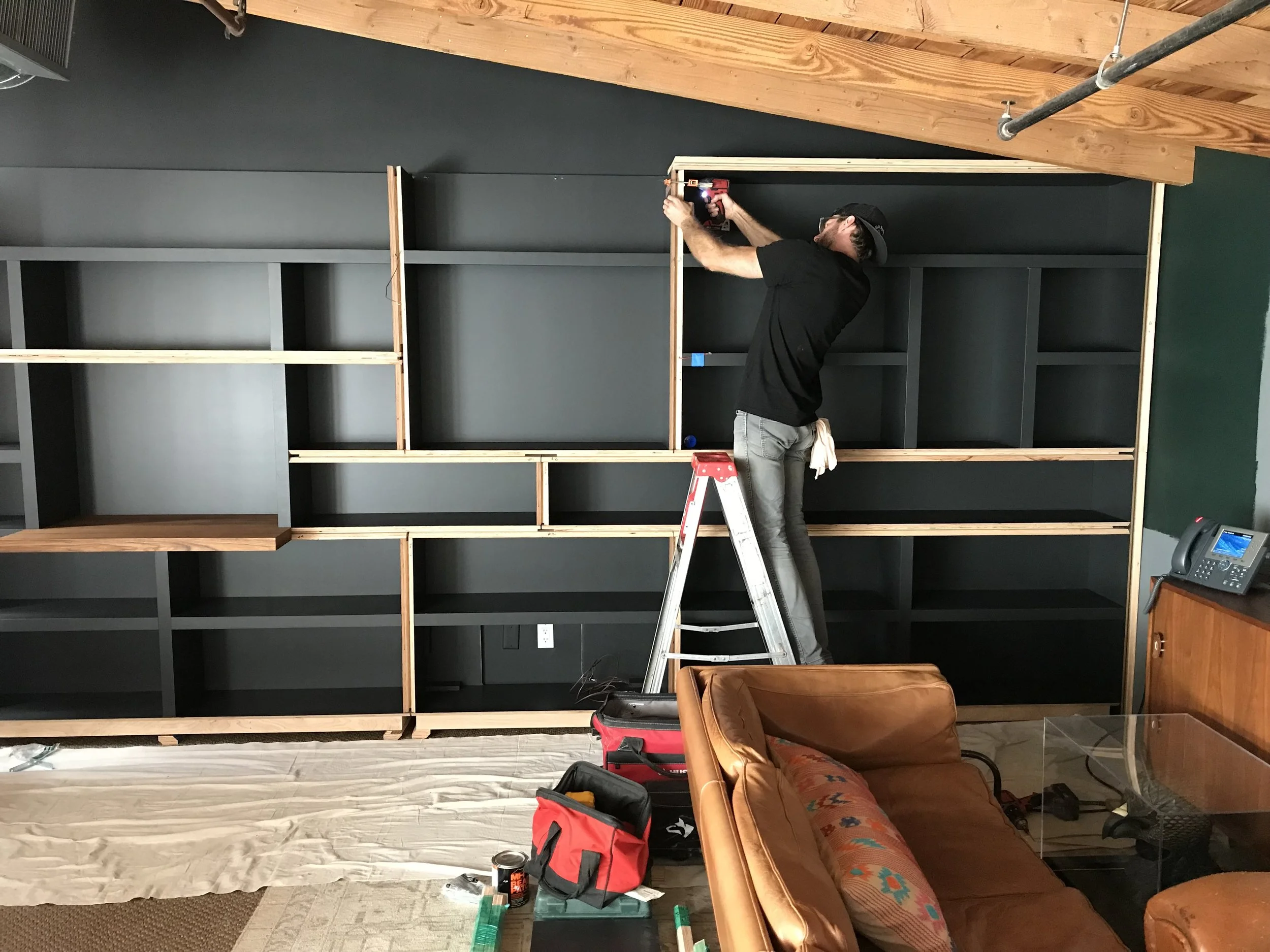  Modules are screwed together in hidden places with black cabinet screws. 