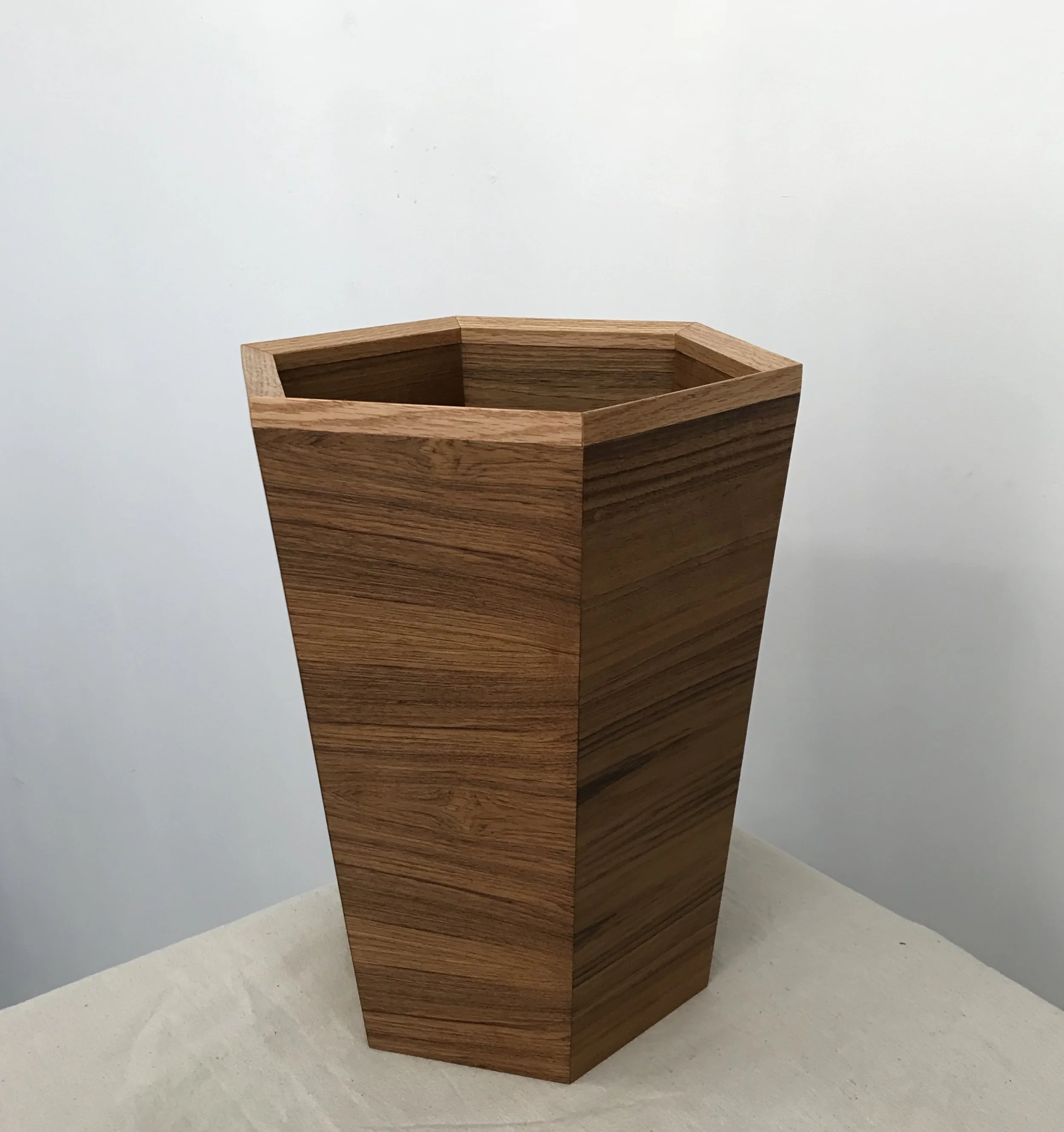   Teak plywood, oak rim.  If you’ve got to look at your trash can, make it a nice trash can. 