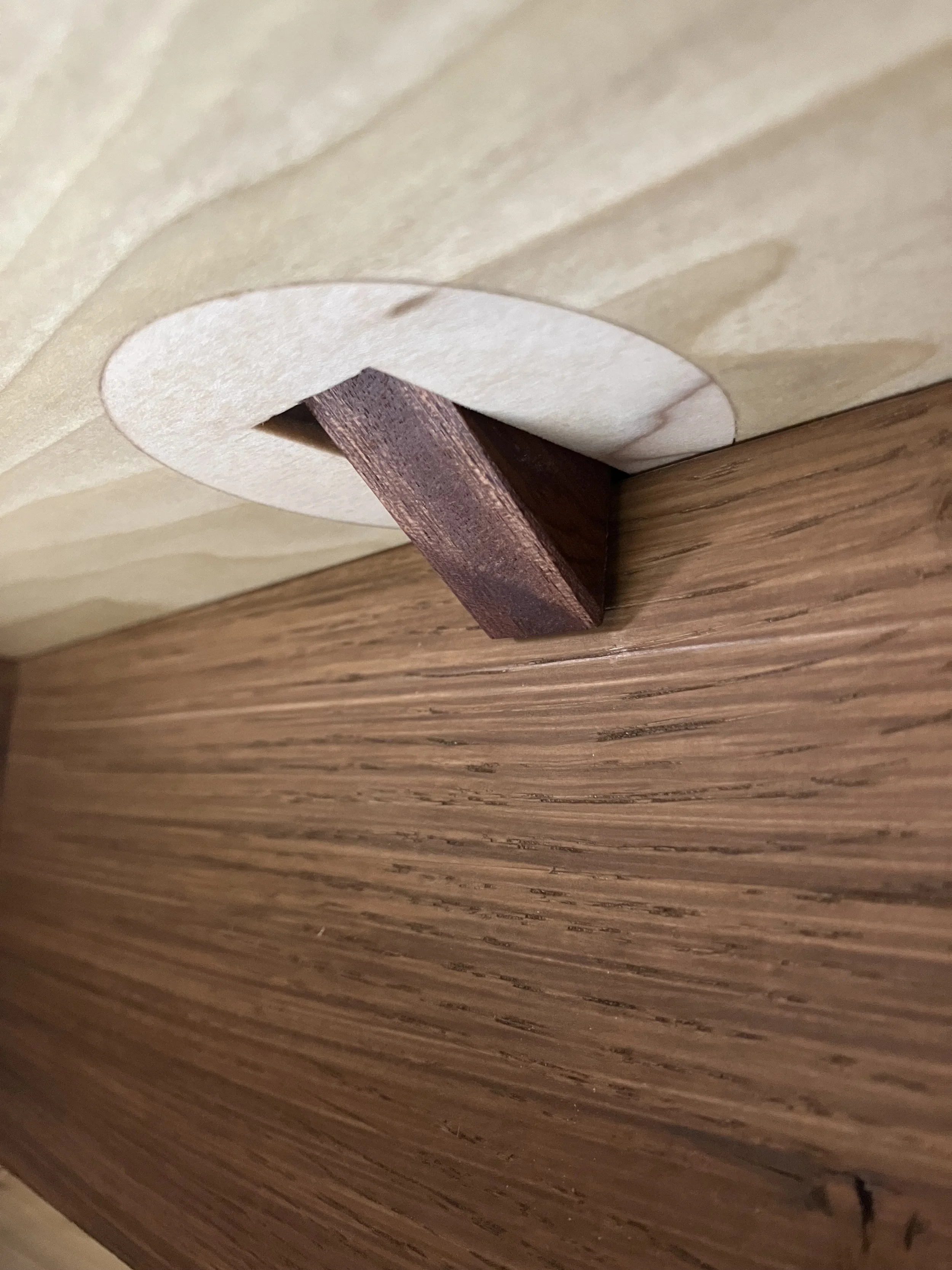  Integrated drawer stops are housed in the top of the case and pivot loosely to a flush position allowing removal of the drawer. 