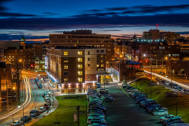 “ Sun Setting Over Portland Maine ” by Matthew Baron licensed under CC BY-SA 2.0