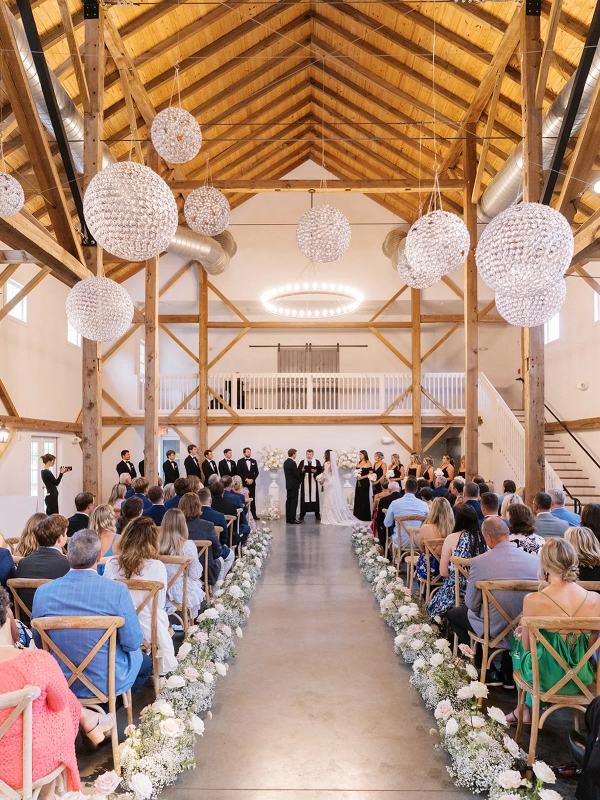 One of our favorite things about the Barn - a seamless indoor ceremony option that feels just as intentional and stunning as an outdoor one ✨ 

Soft natural light, wood beams overhead, and each moment feeling intimate and meaningful. Romantic, timele