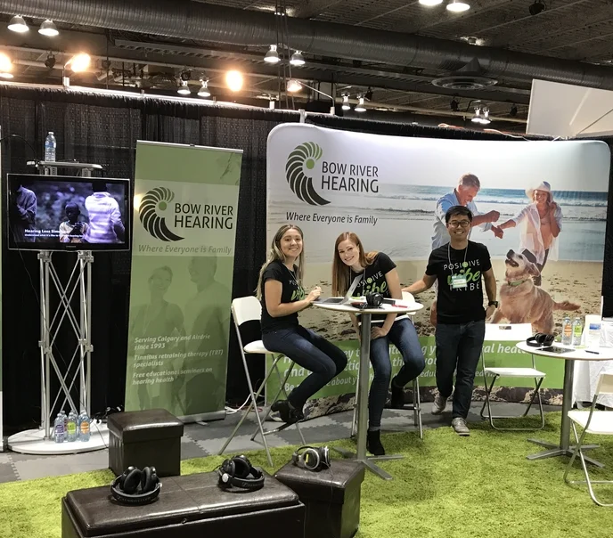 Lacey, Brooke, and Jon giving out FREE hearing tests at the Calgary Fall Home Show.