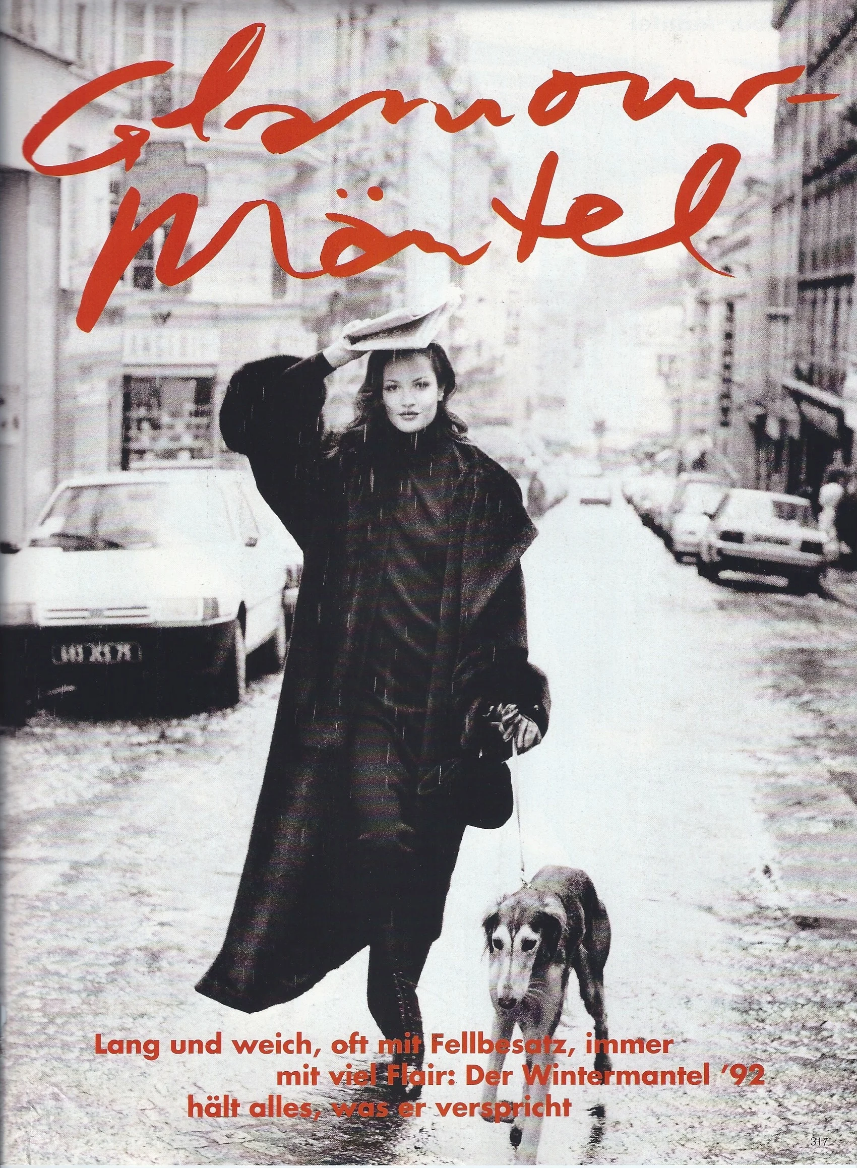 Me in Paris with a dog enjoying the rain for German Vogue shot by Pamela Hanson. Talk about backdrop setting the mood for a shoot!