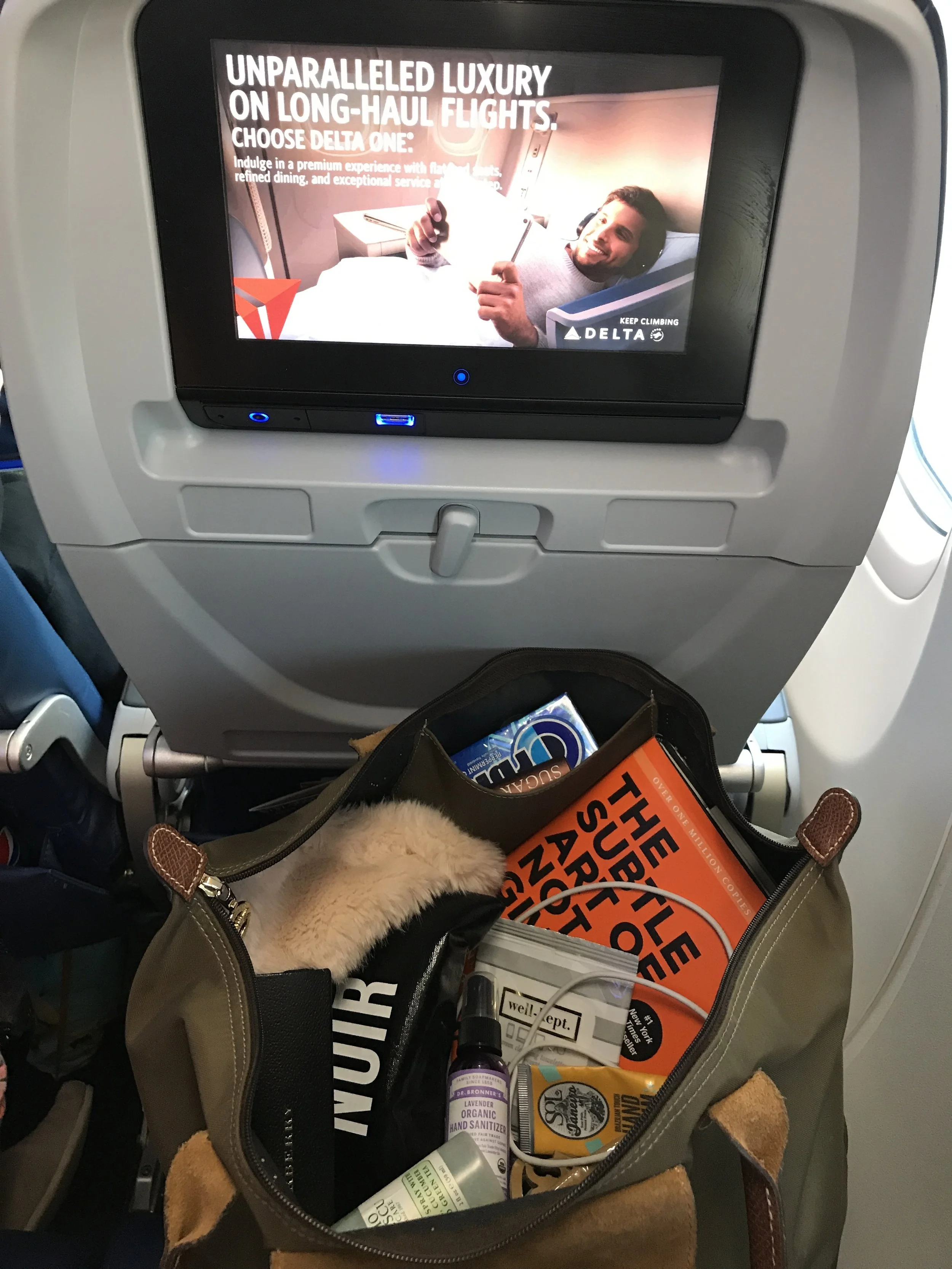 What I Pack In My CarryOn Bag — Modishly Mackenzie